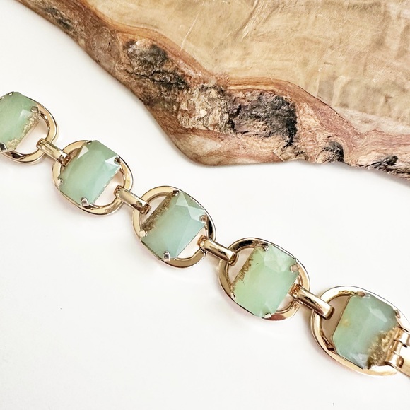 New York & Company Jewelry - New York & Company gold seafoam green faux stone bracelet with gold flakes